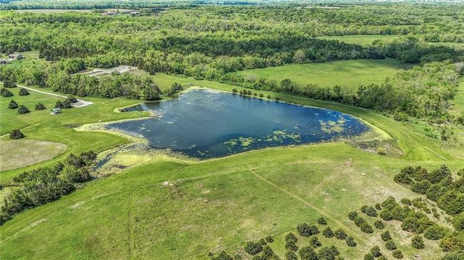 5 different walking trails feed to community private lake. Covered shelter, dock, and plenty of fishing bank. | Image 69