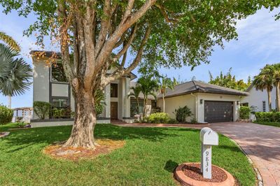 9834 Red Reef Court, House other with 4 bedrooms, 3 bathrooms and null parking in Fort Myers FL | Image 2