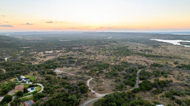 Aerial view of property and surrounding area with a large body of water | Image 5