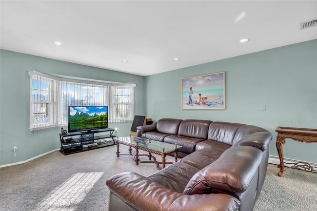 View of carpeted living room | Image 6