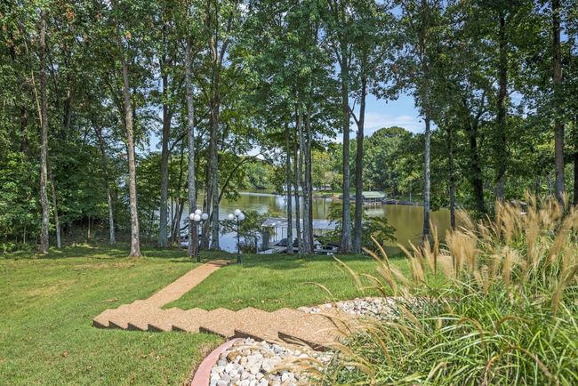 Aggregate sidewalk goes all the way down to Corps of Engineers property | Image 47