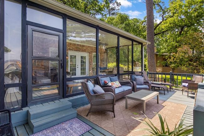 View of patio with an outdoor living space, a deck, and french doors | Image 27