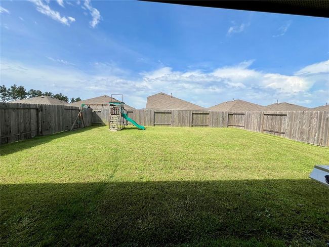 21540 Rustic Elm Dr, House other with 3 bedrooms, 2 bathrooms and 2 parking in New Caney TX | Image 20