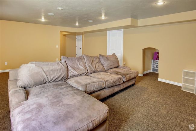Living area with recessed lighting, carpet floors, and baseboards | Image 23