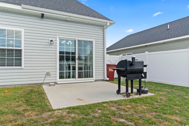 View of patio / terrace featuring fence and a grill | Image 34