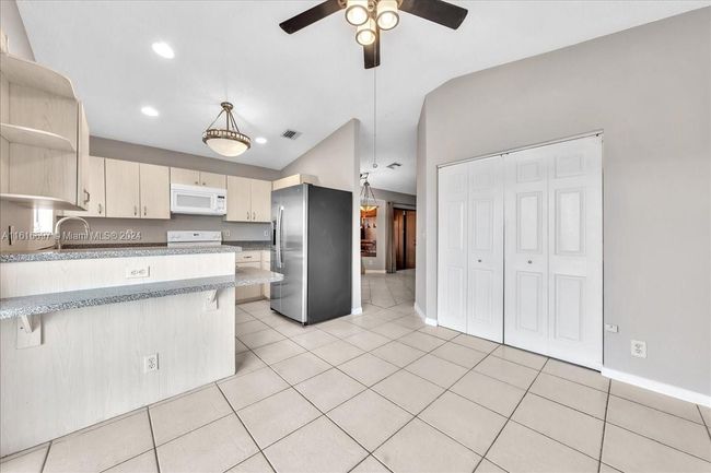 0 - 9780 W Daffodil Ln, Home with 3 bedrooms, 2 bathrooms and null parking in Miramar FL | Image 42