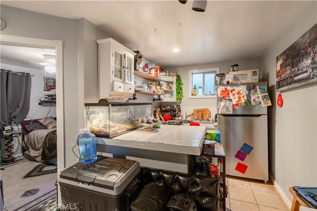 Detached 1-bed, 1-bath guest unit—ideal for income, in-laws, or private office setup. | Image 49