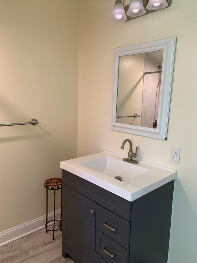 Bathroom featuring vanity. | Image 9