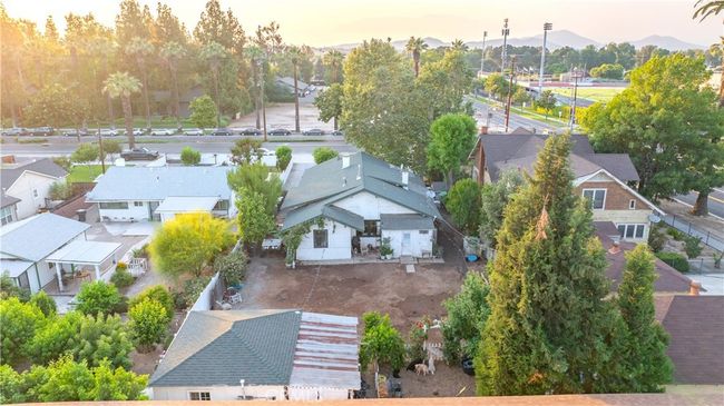 Bird’s-eye views show lot depth, neighborhood proximity, and scale of both main and guest structures. | Image 63
