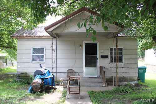 313 W 11th St, Caruthersville, MO, 63830-1813 | Card Image