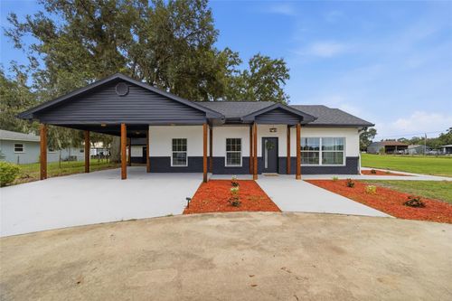 1205 E Knights Griffin Rd, Plant City, FL, 33565-2407 | Card Image