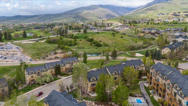 Aerial view featuring a mountain view and a peek of the pool | Image 25