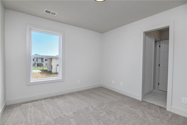 View of carpeted spare room | Image 39