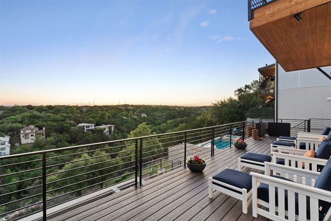 Large deck off of main living area with view of Apache Shores Lake and your private swimming pool | Image 31