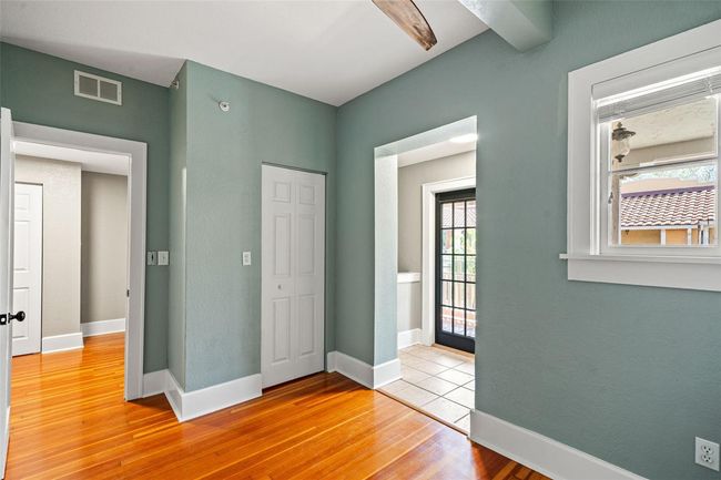 secondary bedroom with balcony access | Image 20