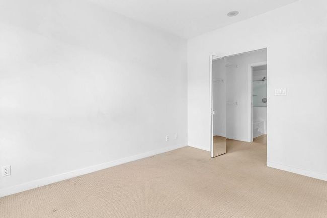 Unfurnished room featuring light colored carpet and baseboards | Image 14