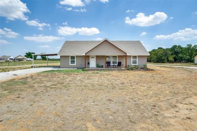 View of front of property featuring a porch and a carport | Image 2