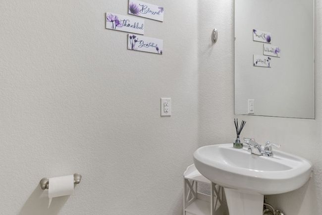 Bathroom featuring a sink | Image 12