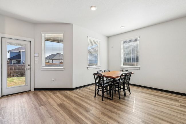 A dining space with a view – perfect for cozy dinners or festive gatherings. | Image 17