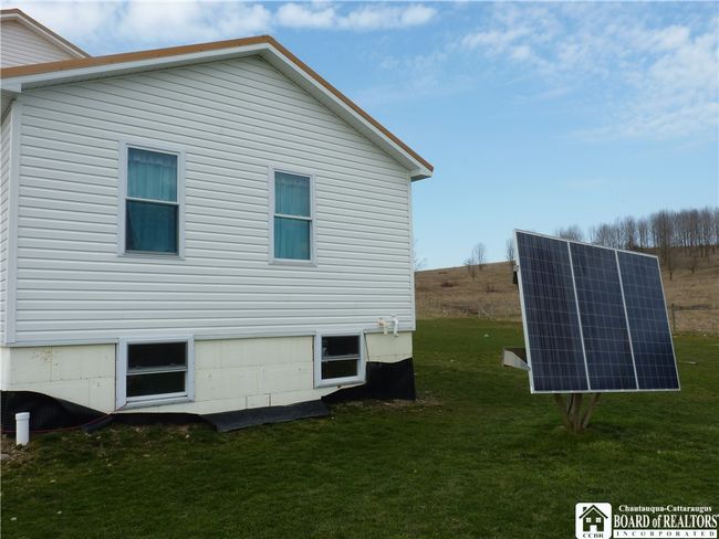 Side of house with solar panel | Image 33