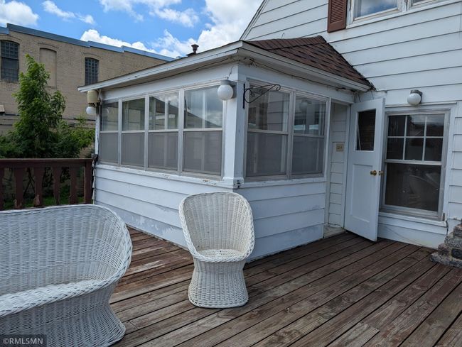 Sunroom leads to deck | Image 20