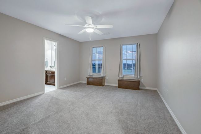 Third and fourth bedrooms share a jack and jill bath. Walk-in closets and fans in both. Two storage boxes for toys etc in third bedroom | Image 33