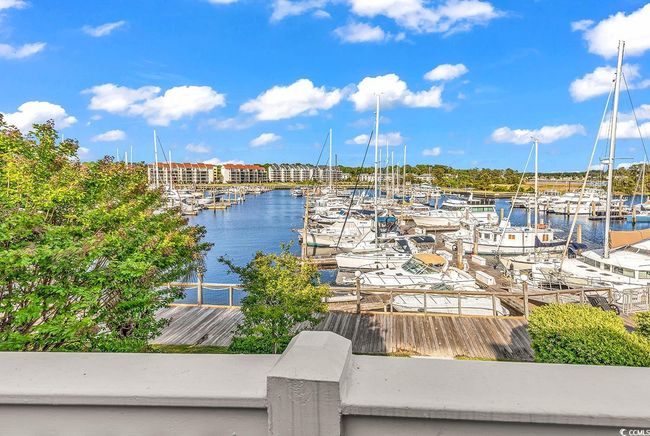 Water view featuring a dock | Image 26