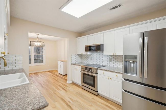 3815 Glen Laurel Ct, House other with 3 bedrooms, 3 bathrooms and 4 parking in Cumming GA | Image 6