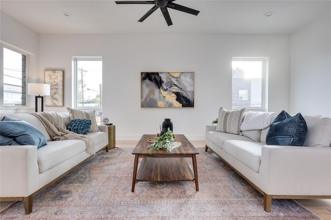Living room with hardwood / wood-style flooring and ceiling fan | Image 20