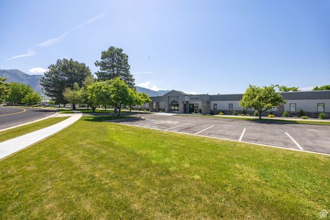 View of green lawn featuring a mountain view | Image 29