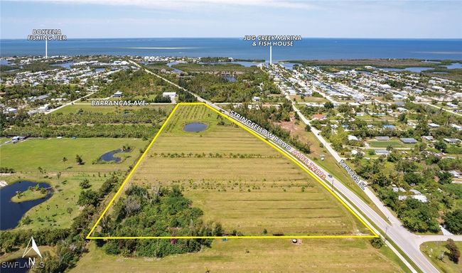 View of property location featuring a large body of water and property boundaries highlighted | Image 4