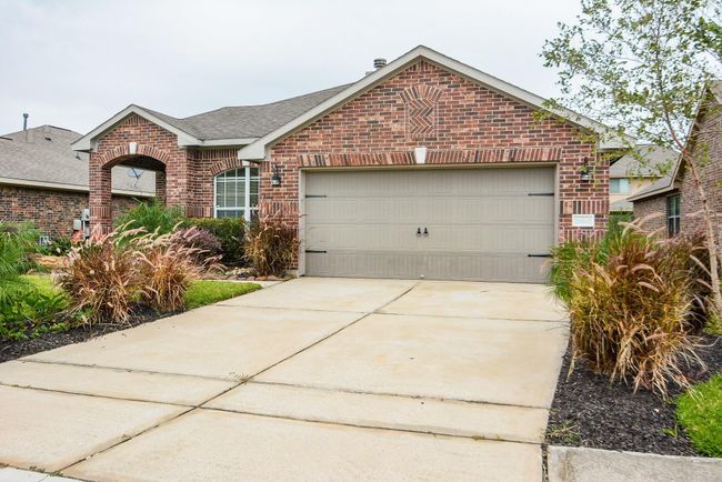 An attached 2 car garage makes for easy access in and out of thehome. | Image 31