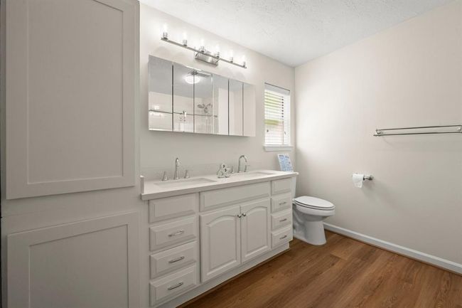 painted cabinets and walls, and stylish lighting | Image 19