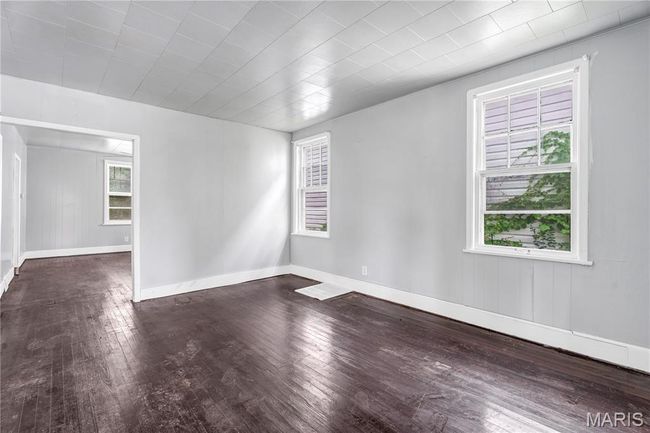 Unfurnished room with hardwood / wood-style floors | Image 6