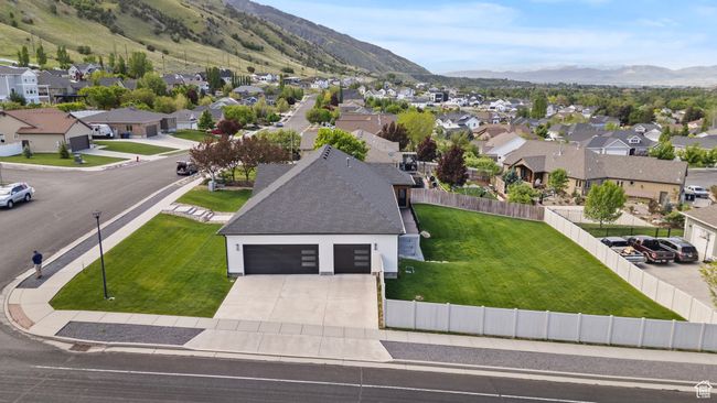 Aerial perspective of suburban area with a mountain backdrop | Image 44
