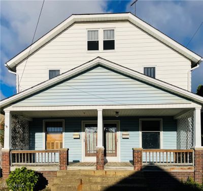 View of front of house featuring covered porch | Image 1