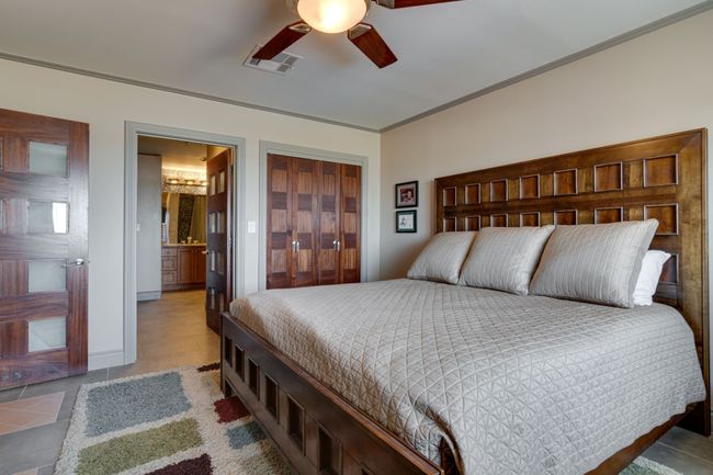 Bedroom #2 looking toward ensuite that is also shared with hall entrance for guests. | Image 11
