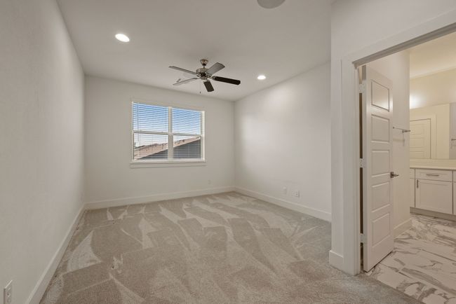 Empty room featuring recessed lighting, marble finish floor, a ceiling fan, baseboards, and light colored carpet | Image 26
