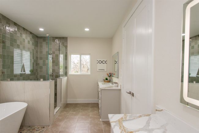 Bathroom featuring vanity, tile patterned floors, and independent shower and bath | Image 26