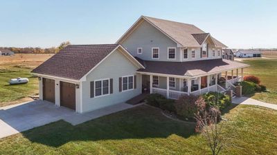 View of front of property with a front lawn and covered porch | Image 2