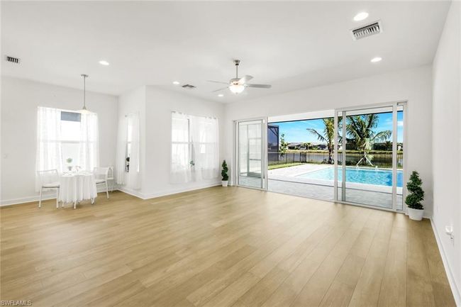 12243 Lotus Ave, House other with 3 bedrooms, 3 bathrooms and 2 parking in NAPLES FL | Image 12