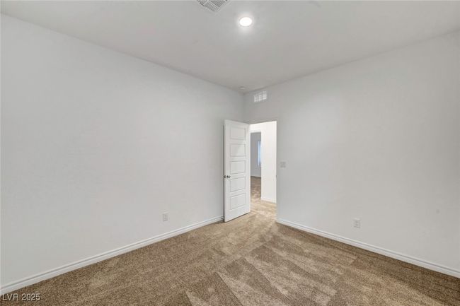 Unfurnished room with baseboards, visible vents, and light colored carpet | Image 40