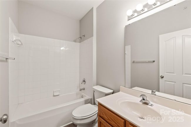 Full guest bath with tub and shower combo | Image 21