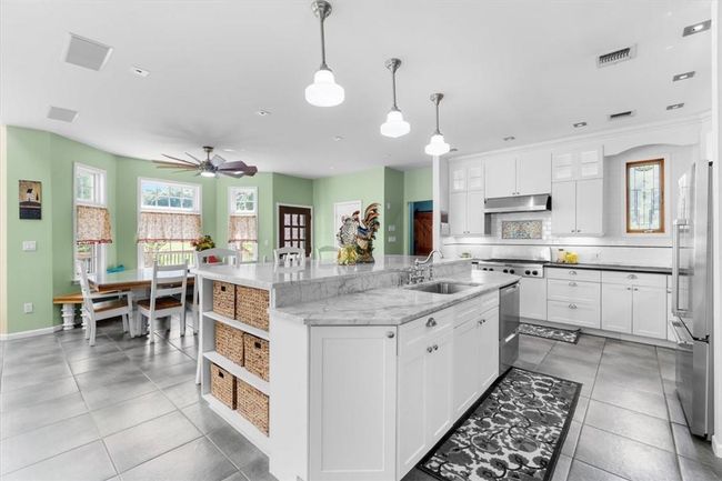Open floor plan is an entertainers dream kitchen. | Image 17