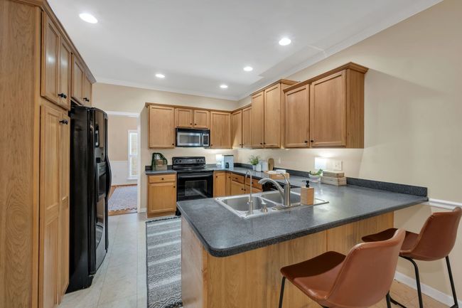 ORGANIC Wood Tones + Soft Selections Flow throughout the Home | Image 16