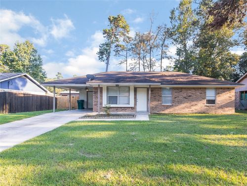 206 N Forest Dr, Willis, TX, 77378-8336 | Card Image