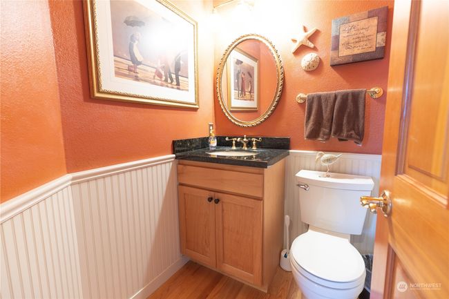 Main floor powder room off of the entry | Image 28