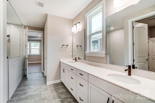Primary Bathroom with Double Sinks-Photo similar to Subject Property | Image 19