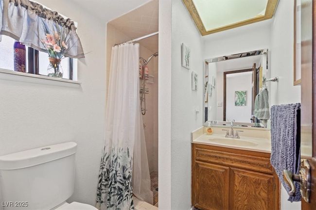 Bathroom with vanity, a stall shower, and toilet in casita | Image 37