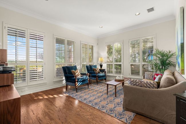 One of three living spaces in this home . This is just beyond the entry foyer and past the downstairs bedroom and full bath - some might call it a formal living room. | Image 5